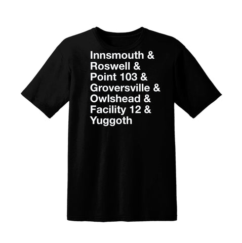 Black Delta Green World Tour t-shirt with the following text printed on it in white ink - Innsmouth & Roswell & Point 103 & Groversville &Owlshead & Facility 12 & Yuggoth